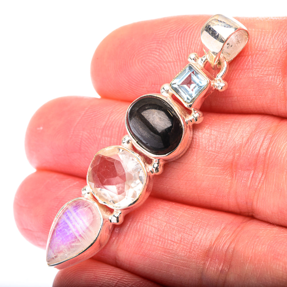 White Quartz, Star Diopside, Rainbow Moonstone, Blue Topaz Pendant 1 7/8" (925 Sterling Silver) PD38571